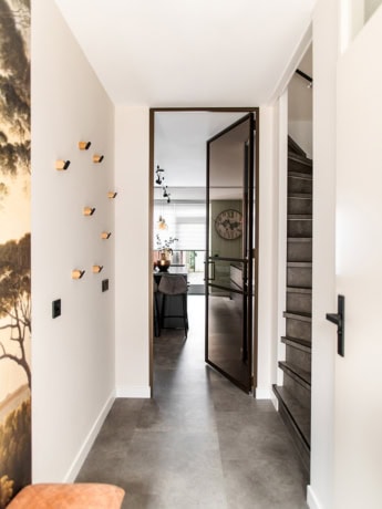 Modern steel interior door with glass and black finish, designed bespoke by Aluwdoors for a stylish home layout.