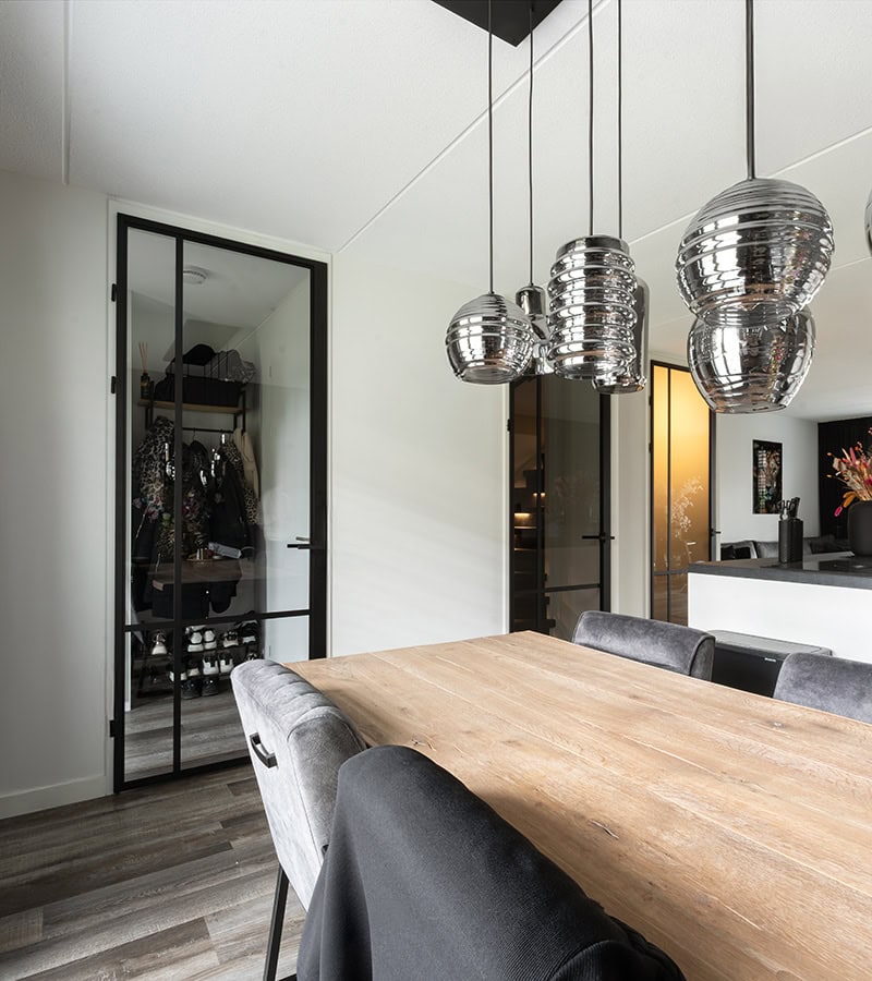 Gladijatoren staalglazen tuindeur met metalen kader en duw-/treksysteem.