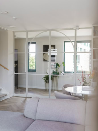 Comfortable steel partition with glass panels for modern interior design, customised, minimalist design, high-quality finish, suitable for living and office spaces, aluminium style.