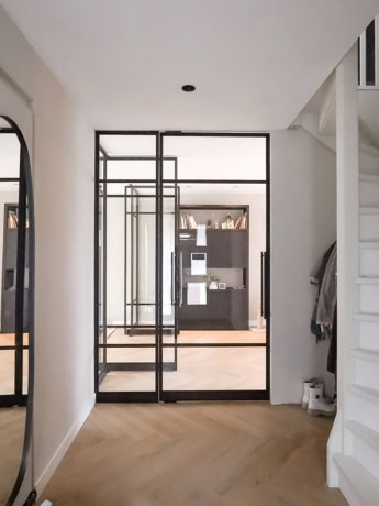 High-quality steel sliding door with black frame, modern partition for stylish layout and privacy, custom-made by Aluwdoors.