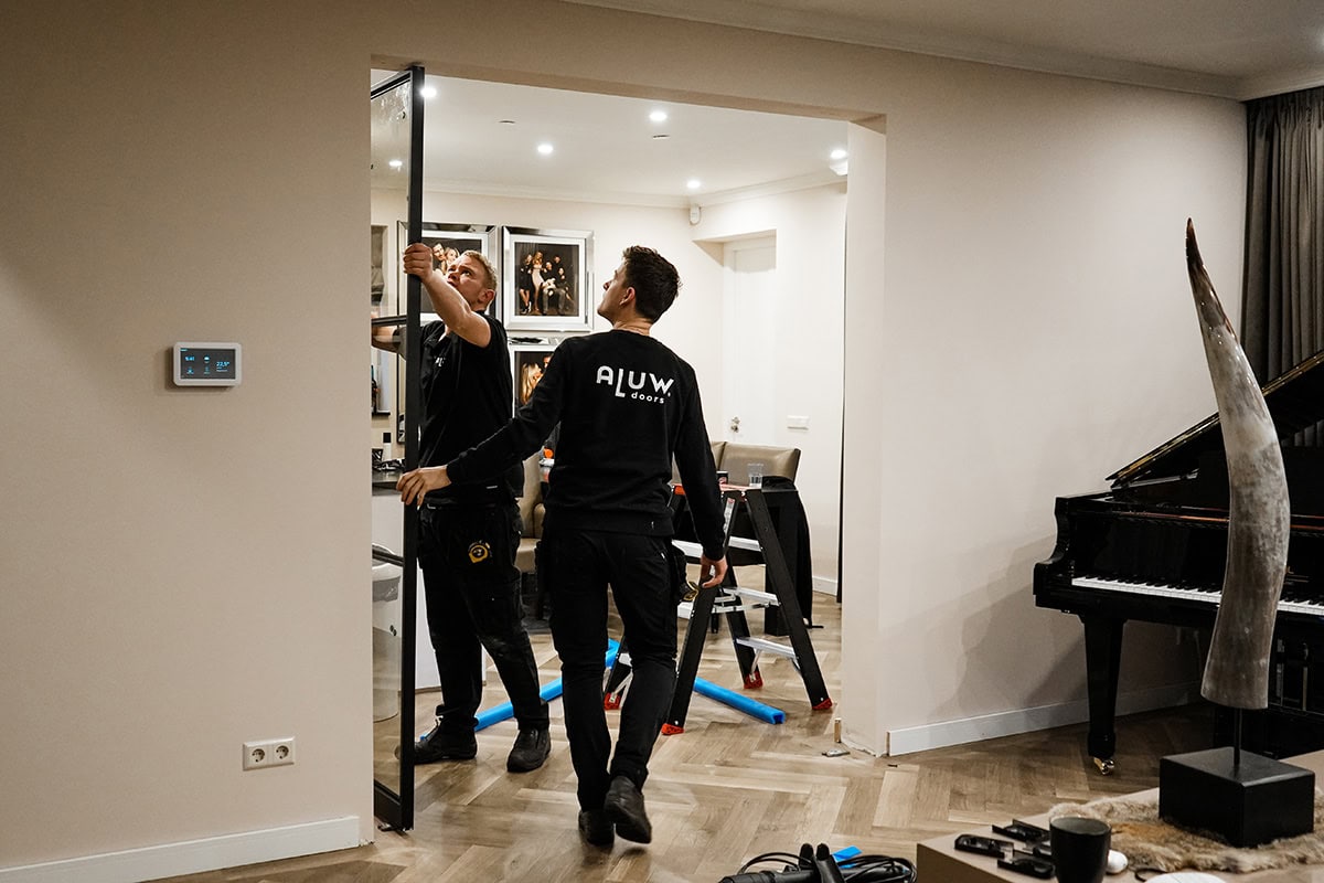 Mounting a steel pivot door