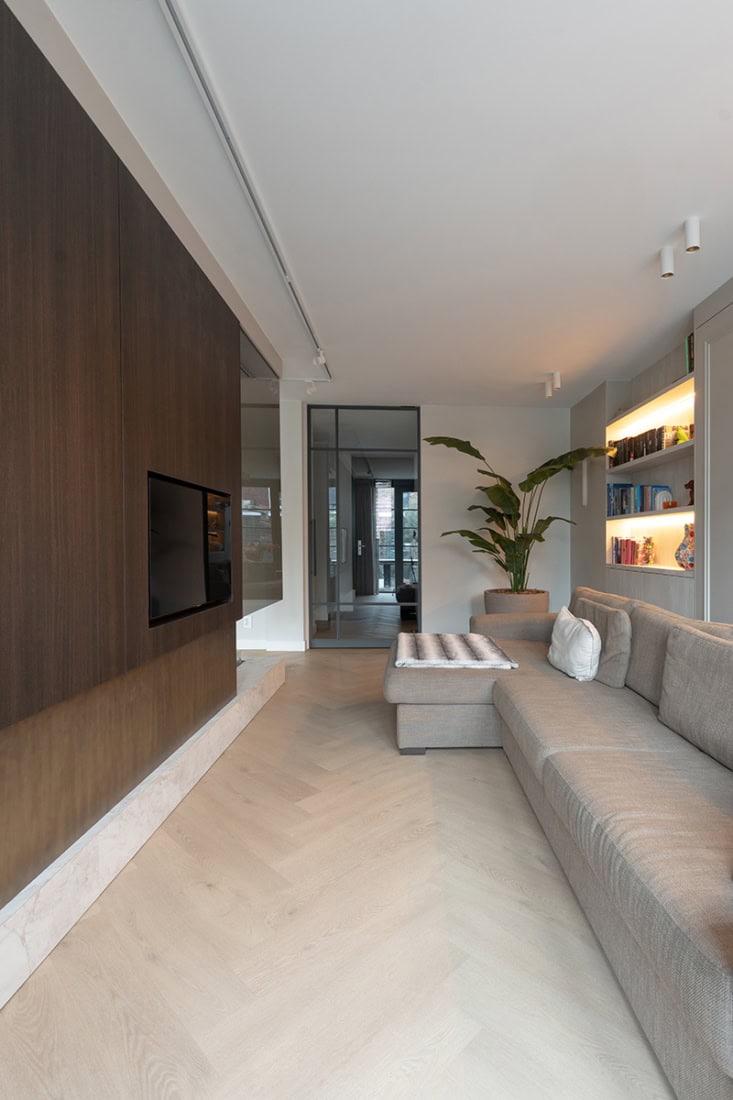 Sleek design with steel partition and custom-made doors in modern interior.